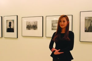 Jihye Bang with her photography. (Photo: Allison Grogan/Submitted